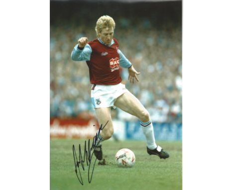 Frank McAvennie West Ham Signed 12 x 8 inch football photo. Good Condition. All autographs are genuine hand signed and come w