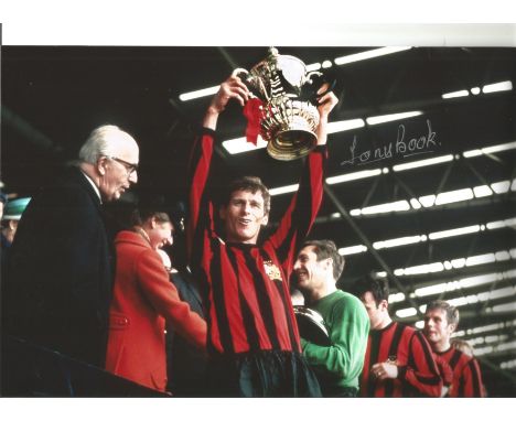 Football Tony Book 8 x 12 inch signed colour photo pictured lifting the FA Cup while captain of Manchester City. Anthony Keit