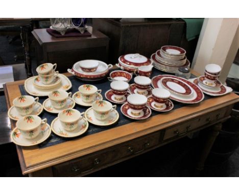 A H&amp;K Tunstall Art Deco porcelain part tea set, with foliate decoration in orange, black and green on white ground, compr