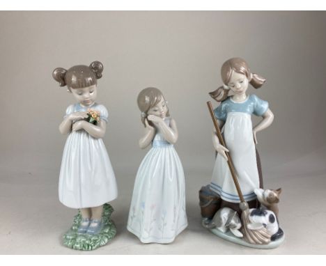 Three Lladro porcelain figures of girls, 'Playful Kittens' ''Flowers for Mommy' and 'My Sweet Princess', all with original bo