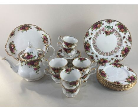 A Royal Albert Old Country Roses part tea set for eight, comprising teapot, eight teacups, saucers, and teaplates, a cake pla