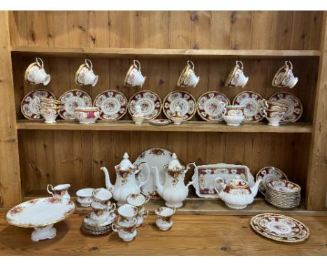 A Royal Albert Old Country Roses porcelain part coffee set, comprising two coffee pots, cake stand, seven cups and six saucer