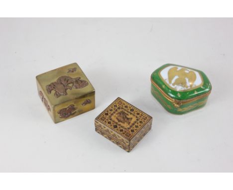 A Tunbridgeware stamp box, 4.2cm, a French porcelain and gilt metal mounted trinket box, the hinged lid decorated with an eag