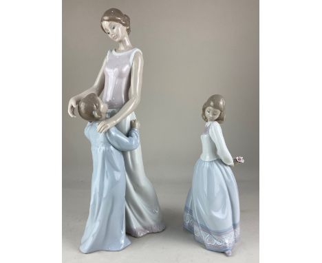 Two Lladro porcelain figures, 'Someone to look up to' a group of mother and child, with original box and 'Sweet and shy', tal