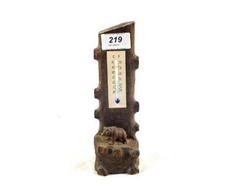 A Black Forest carved Bear and tree with thermometer