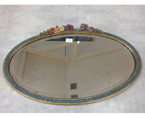 An oval Barbola mirror and a pair of coloured portrait prints