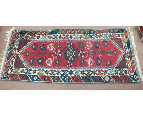 A Dosemealti runner with tree of life central design, 68" x 29"