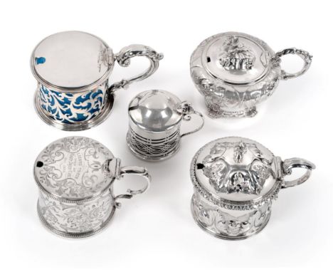 A Group of Five Silver Mustard Pots comprising: a drum shaped pot with engraved sides and cover, Thomas Smily, London 1866; a