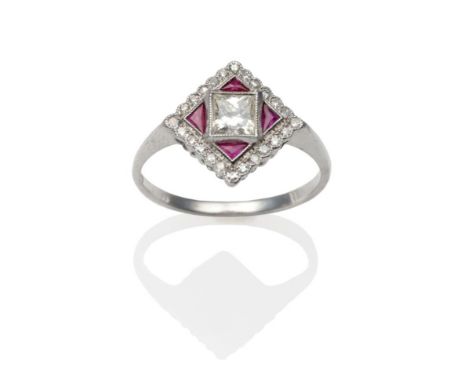 An Art Deco Style Diamond and Ruby Ring, a princess cut diamond within a diamond shaped frame set with calibré cut rubies and