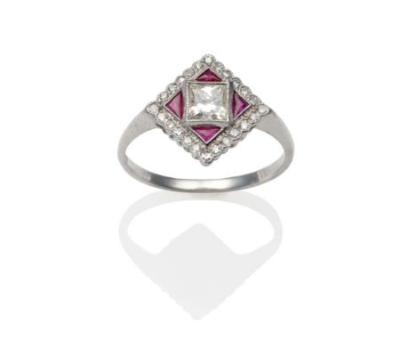 An Art Deco Style Diamond and Ruby Ring, a princess cut diamond within a diamond shaped frame set with calibré cut rubies and