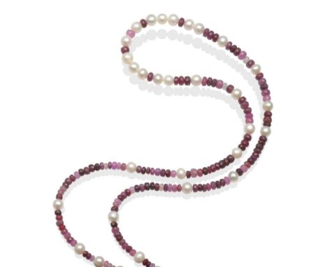 A Cultured Pearl and Ruby Necklace, cultured pearls spaced by groups of shaded faceted ruby beads of various stones, 80cm lon