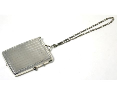 An Art Deco Silver Aide-Mémoire, import marks Selfridge & Co Ltd, London circa 1930, of rounded rectangular form, the exterio