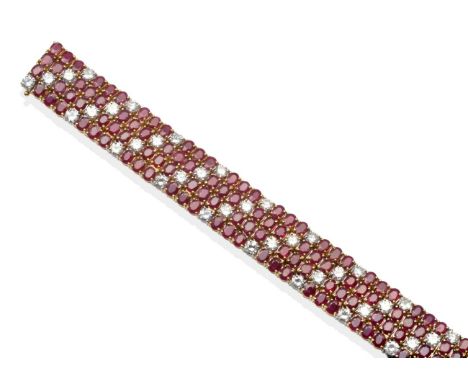 A Ruby and Diamond Bracelet, four rows of round cut rubies and round brilliant cut diamonds, diagonally set in white and yell