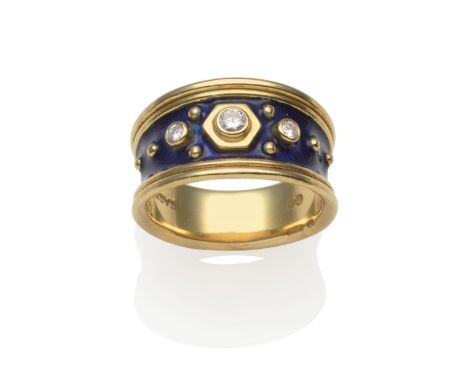 An 18 Carat Gold Diamond and Blue Enamel Ring, by Elizabeth Gage, three graduated round brilliant cut diamonds in yellow rubb