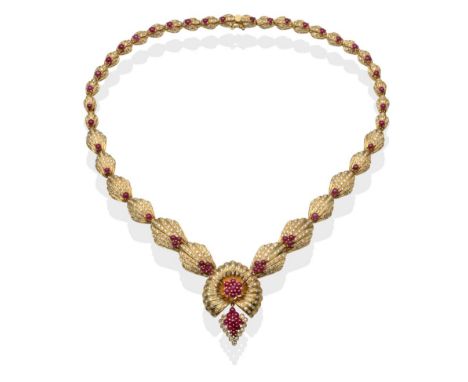 A Ruby and Diamond Collar, of fan shapes pavé set with round brilliant cut diamonds, and cabochon rubies, total estimated dia