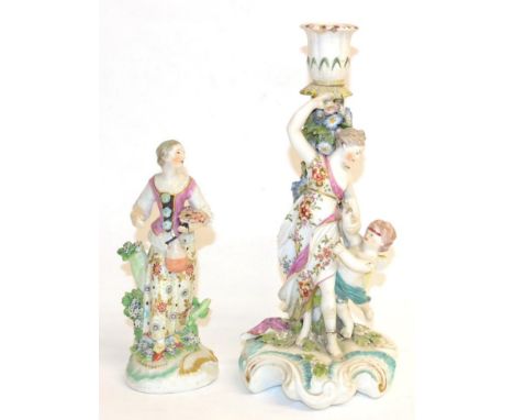 A Derby Porcelain Figure of a Girl, circa 1770, standing holding a flask, on a scroll moulded base, 18.5cm high; and A Derby 