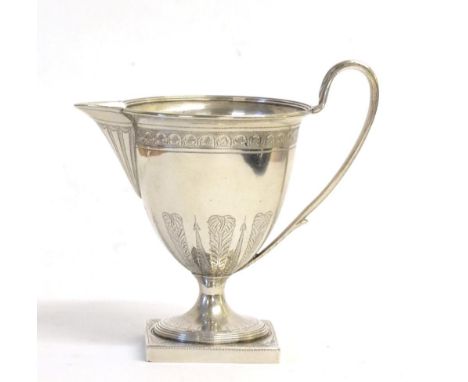 A George III Silver Pedestal Cream Jug, Henry Chawner, London 1794, the circular body with bright cut decoration, reeded loop