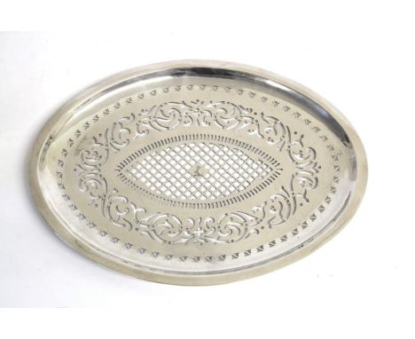 A George III Silver Mazarine, Henry Chawner, London 1788, oval, with typical pierced decoration and an engraved crest to the 