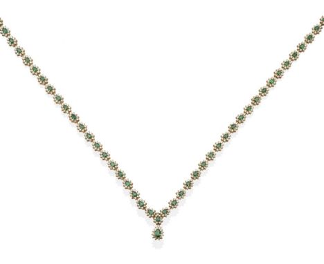 An Emerald and Diamond Necklace, comprising clusters of pear cut emeralds within borders of round brilliant cut diamonds with