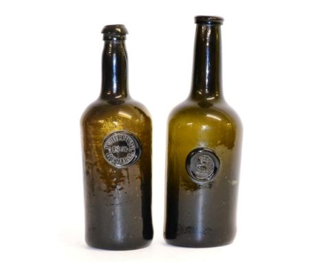 A Sealed Wine Bottle, dated 1805, of shouldered cylindrical form, applied with a circular seal inscribed J WHITWELL, KENDAL, 