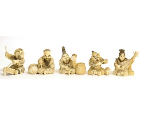 A Set of Five Japanese Ivory Okimonos of Musicians, Meiji period, each seated playing a variety of instruments, signed, 6cm t