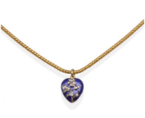A Diamond and Blue Enamel Heart Shaped Locket Pendant, overlaid with a floral motif set with rose cut diamonds, with a glazed