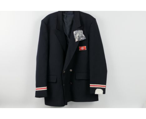 A vintage British Rail jacket with insignia and buttons and a hallmarked silver and enamel lapel badge for National Union Of 