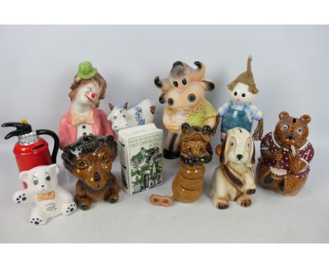 A collection of ceramic money banks.