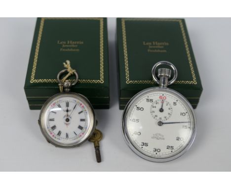 A silver cased, open face lady's pocket watch with Roman numerals to a white, floral painted enamel dial, marked W Berry Ella