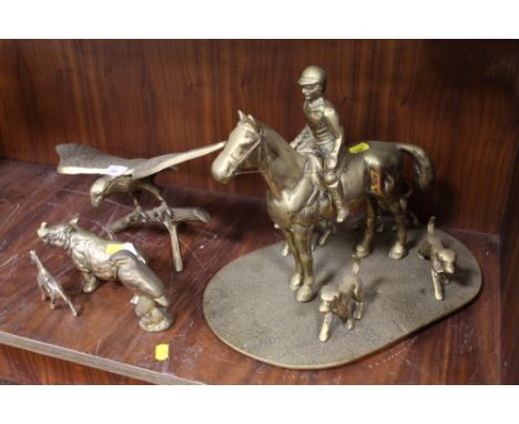 A DECORATIVE BRASS FOX HUNTING FIGURE SCENE, TOGETHER WITH OTHER BRASS ORNAMENTS