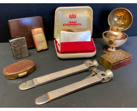 A continental 900 grade silver mounted cigar cutter;  another unmarked;  Consul Crown deck top lighter, boxed;  globe lighter