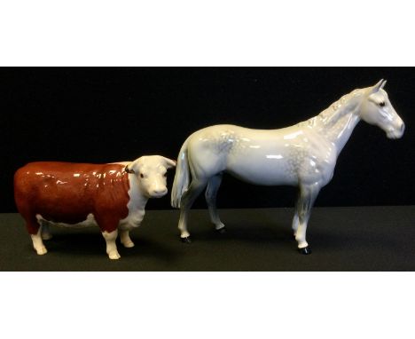 A Beswick model Hunstmans Horse, grey gloss colourway;  a Champion of Champions Bull. 