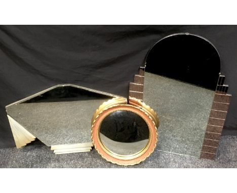 An arched topped peach and clear glass architectural design wall mirror, 77cm high, 51cm wide;  another Art Deco;  a circular
