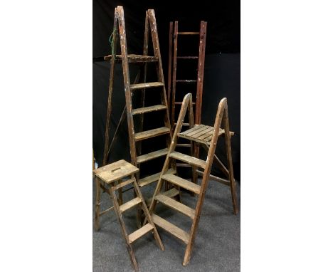 A set of vintage wooden seven step step ladders,  184cm high(open); another 122cm high (open); another 64cm high(open) ; a tw