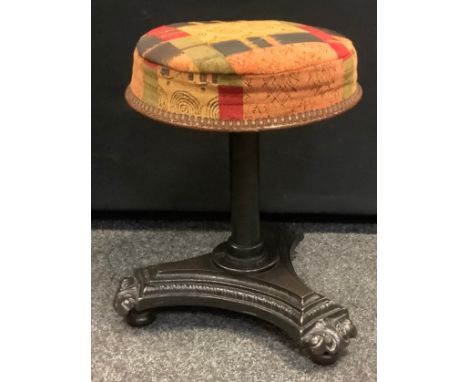 A Victorian cast iron revolving piano stool, cushioned seat, tripod base, 46cm high(not extended) 