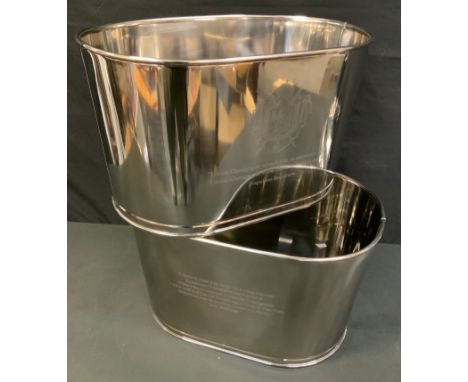 A pair of  contemporary chrome reproduction champagne trough, inscribed with Lily Bollinger quote 'I drink it when I'm happy 