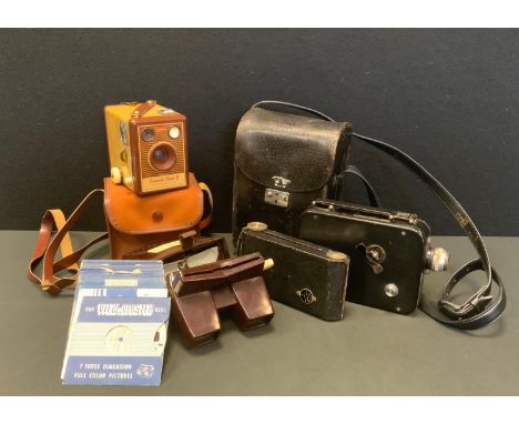 A View-master brown mottled case with light box adapter, assorted viewing disc inc Donald Duck Deep Sea Diver;  Aladdin, Alic