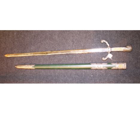 Intricate vintage style sword in green scabbard