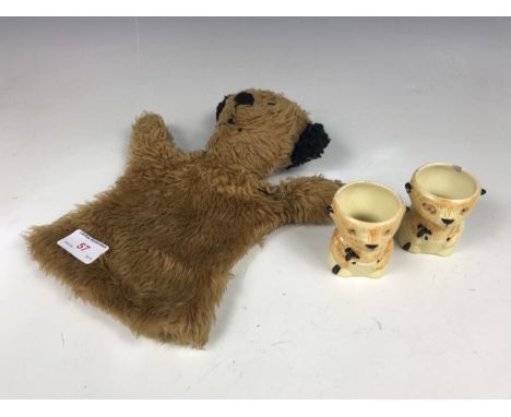 A 1960s 'Sooty' glove puppet together with two Keele Street pottery egg cups