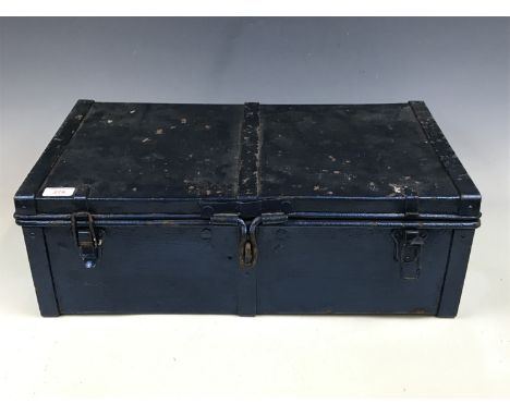 A blue painted tin trunk