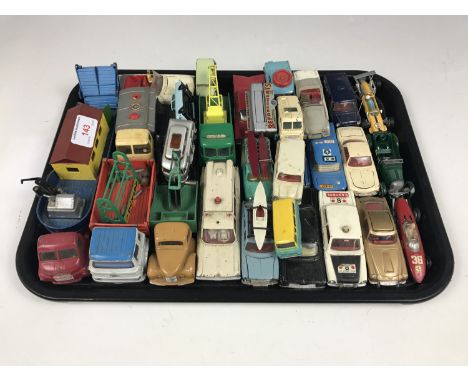 A quantity of vintage Matchbox and Dinky Toys including a Bedford Tractor Unit with a low loader, an Austin A60, an ambulance