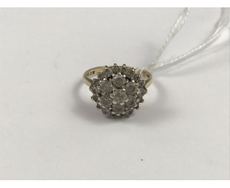 A 9ct gold and paste cocktail ring, in a flower-head cluster arrangement