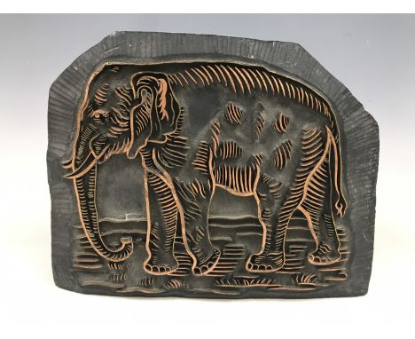 A vintage printing block depicting an elephant