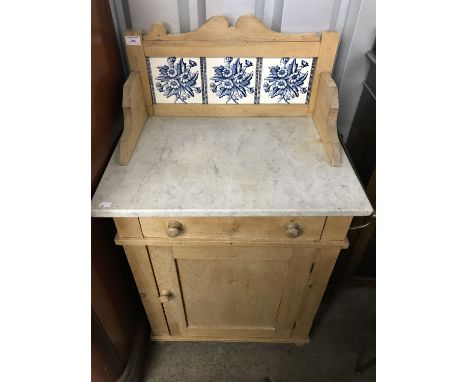 A Victorian tile-backed and marble-topped pine single wash stand