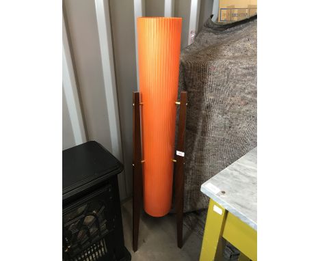 A 1970s teak lamp and shade