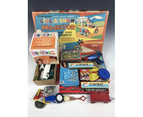 Vintage toys and games including a boxed clockwork "Coffin Bank" and a Chad Valley "Give a Show" projector