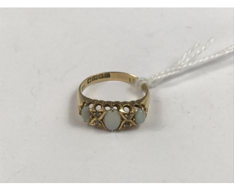 An 18ct gold and opal dress ring