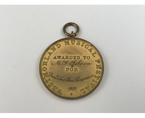 A Victorian Westmorland Music Festival "Female Voice Choir" competition prize medallion awarded to M G Gibson