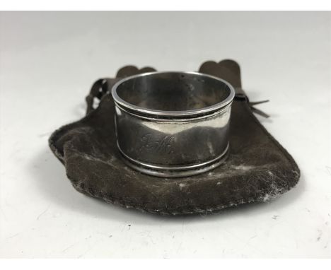 A silver napkin ring by Emile Viner of Sheffield