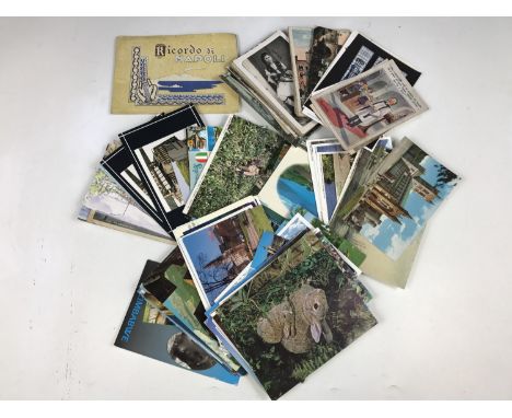 A quantity of vintage travel postcards etc
